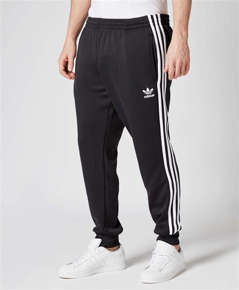 mens adidas original superstar track pants|Adidas originals fitted track pants.